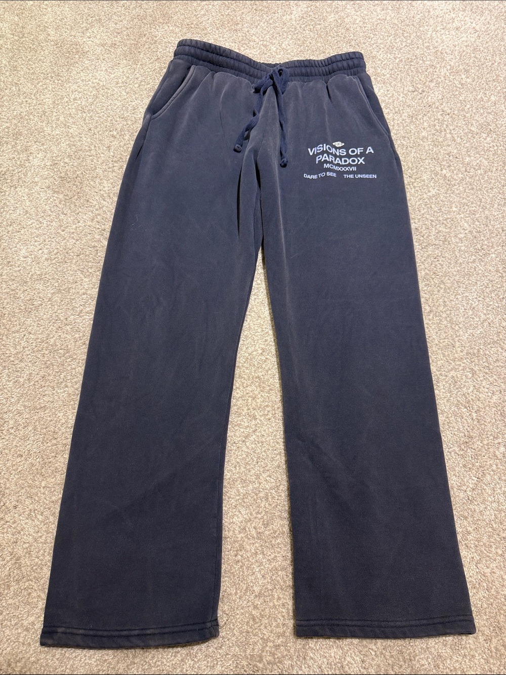 Sweatpants with 'Visions of a Paradox' Graphic